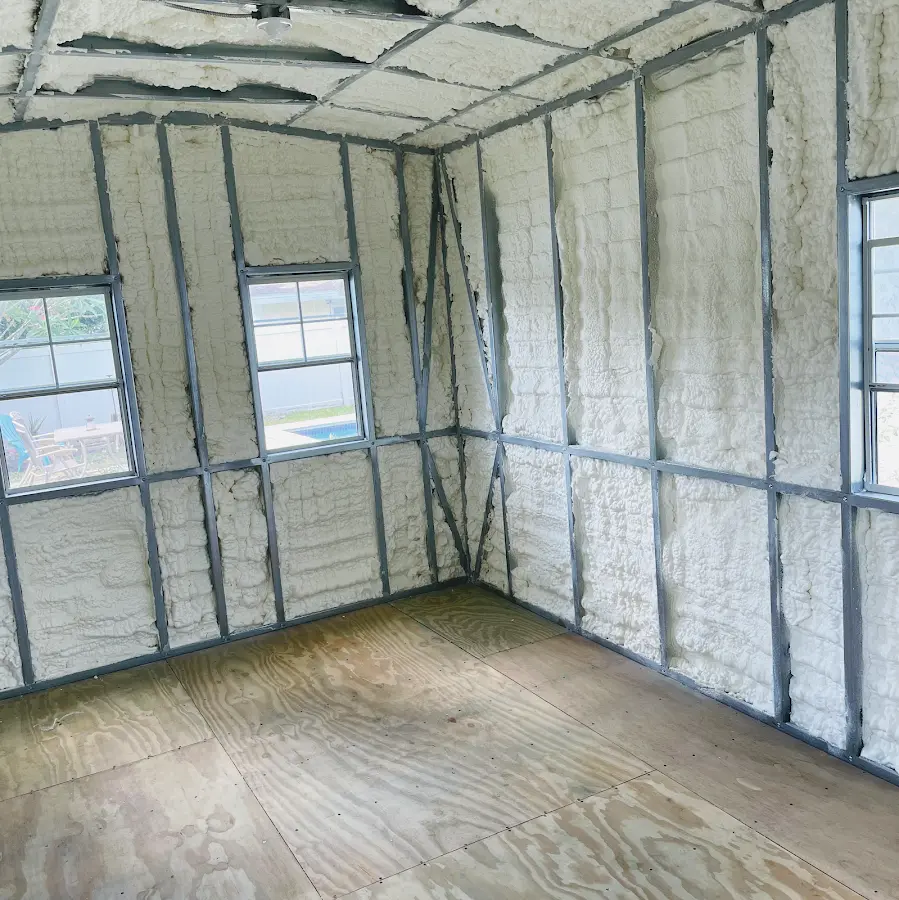 Closed-cell spray foam insulation applied to wall cavities in a residential project in Albany